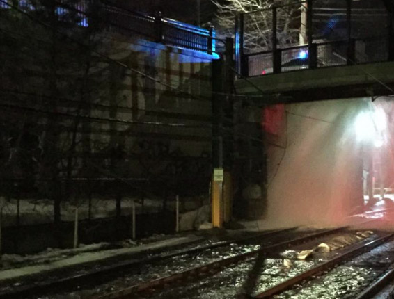 Exploded water main above Green Line in Brookline Hills
