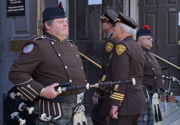 Standing at attention at Faneil Hall to honor fallen EMTs and paramedics.