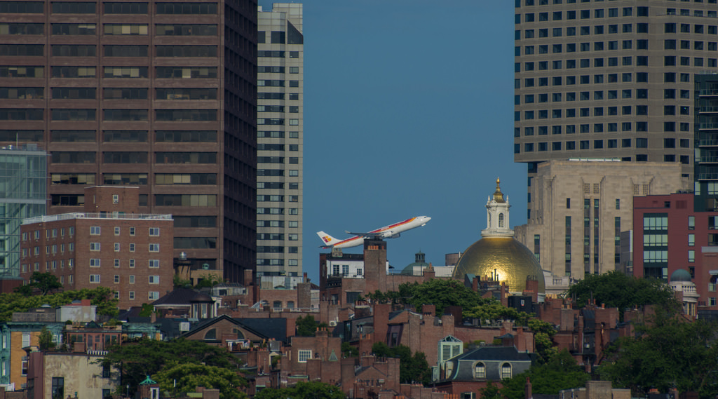 Iberia jet takes off over Boston Harbor