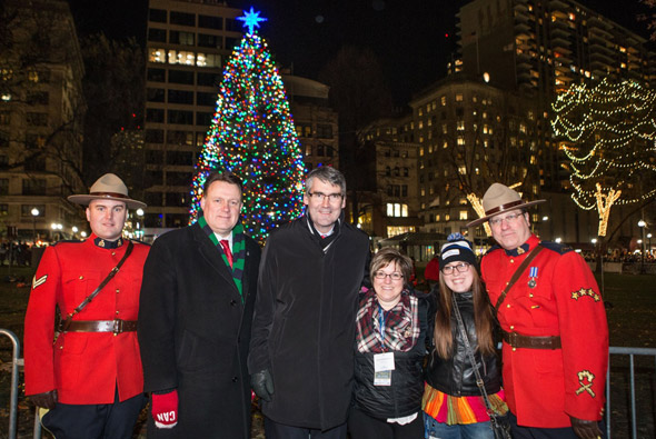 Canadians in front of the Boston Christmas tree, a gift from Nova Scotia