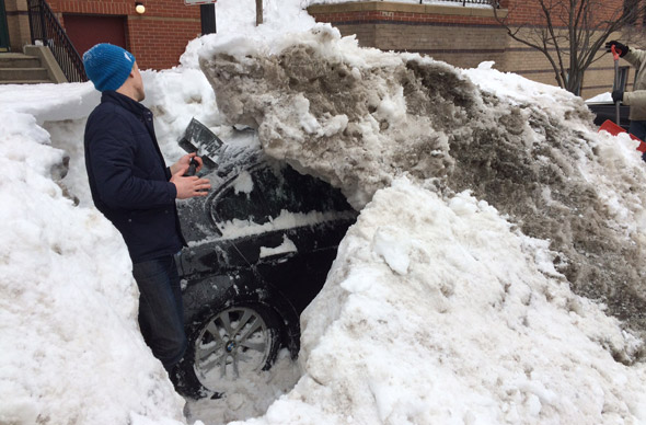 Shoveling out a frozen car in the South End