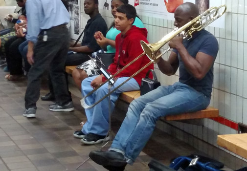 Trombonist on the Orange Line at Downtown Crossing