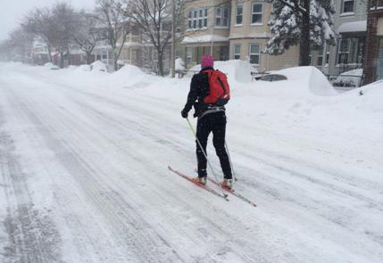 Cross country skier on Highland Avenue in Somerville