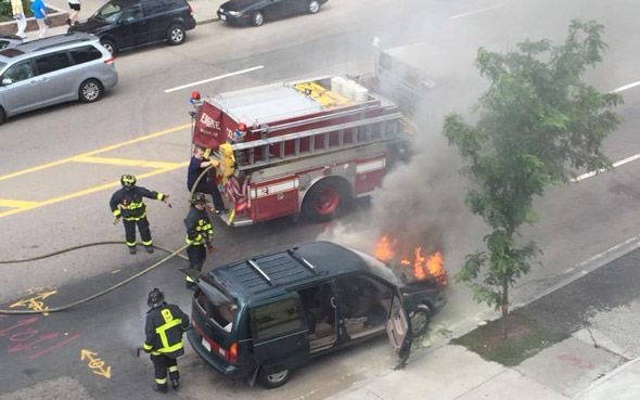 Minivan on fire in Dorchester