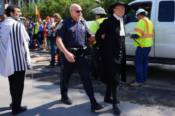 Rev. John Gibbons of the First Parish in Bedford - and chaplain for the town's Minutemen - under arrest.