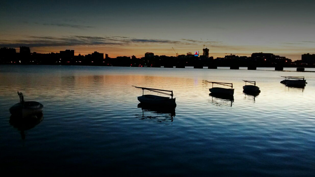 Boats on the Charles River at sunset