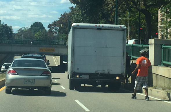 Truck backing up on Memorial Drive in Cambridge