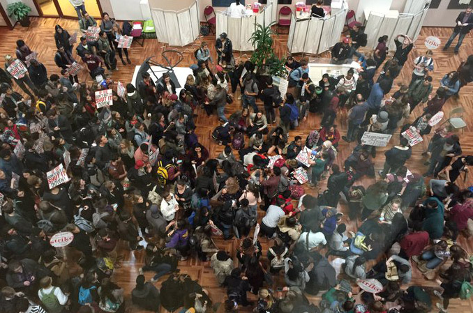 Harvard students occupy Harvard builidng in support of striking workers
