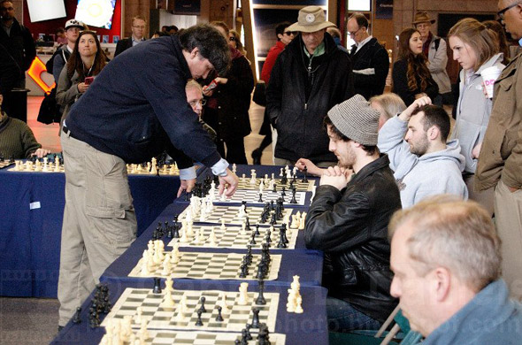 Chess grandmaster in simultaneous games at South Station