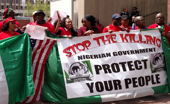 Nigerians protesting outside Boston City Hall
