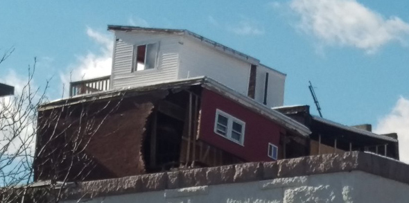 Partially collapsed building.