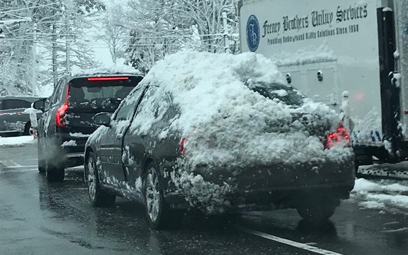 Masshole driver can't be bothered with removing snow