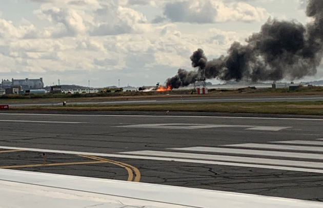 Flaming plane at Logan Airport