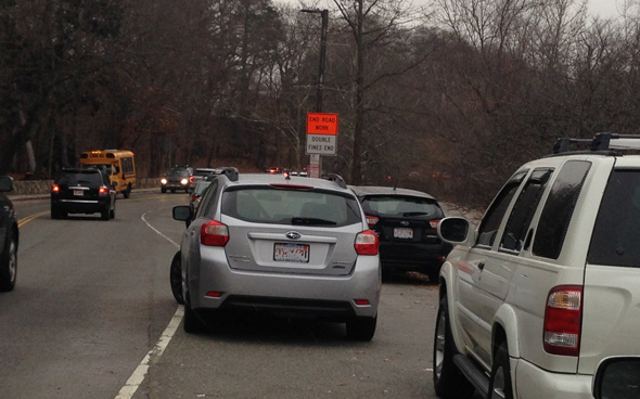 Car parked badly at Jamaica Pond