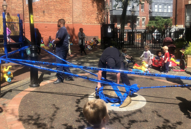 City workers taping off hot turtle at Myrtle Street playground