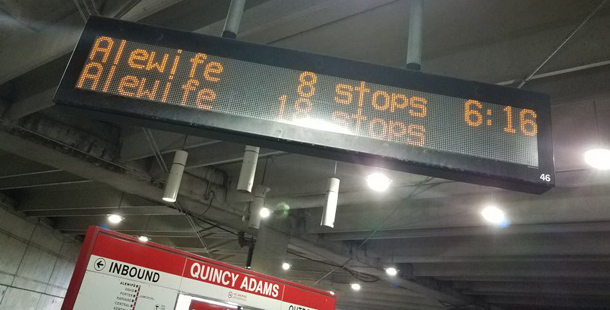 Quincy Adams sign says train is 18 stops away