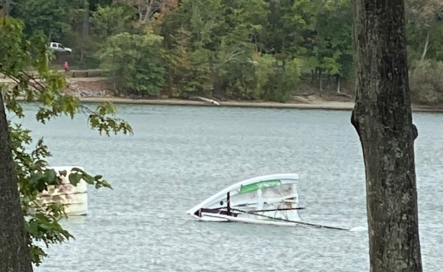 Jamaica Pond sailboat knocked over by the wind