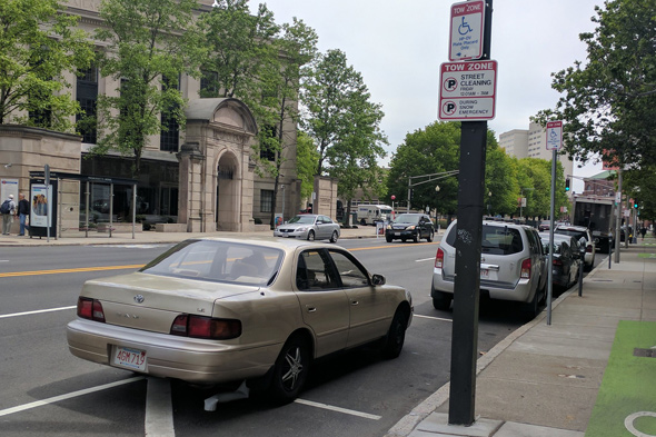 Badly parked car on Massachusetts Avenue in Boston