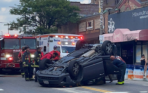 Overturned car on Harvard Avenue
