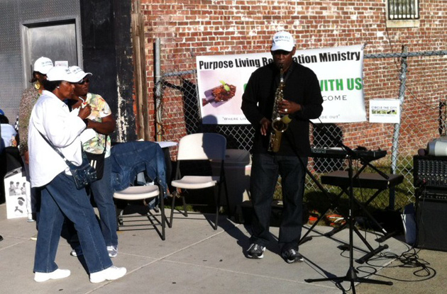 Playing the sax on Blue Hill Avenue