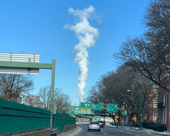 Plume of smoke or water vapor rises above Storrow Drive