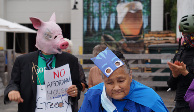 Pig and senior protest lawsuit against senior housing in Jamaica Plain