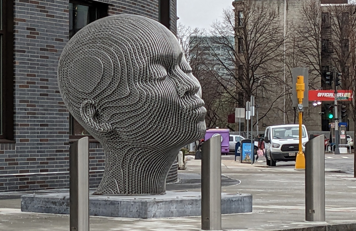 Giant-head statue outside Boston Arts Academy