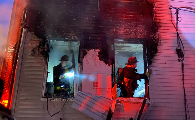Firefighters at Corona Street fire