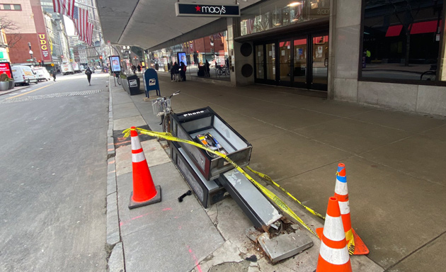 Pay phone down on Summer Street outside Macy's