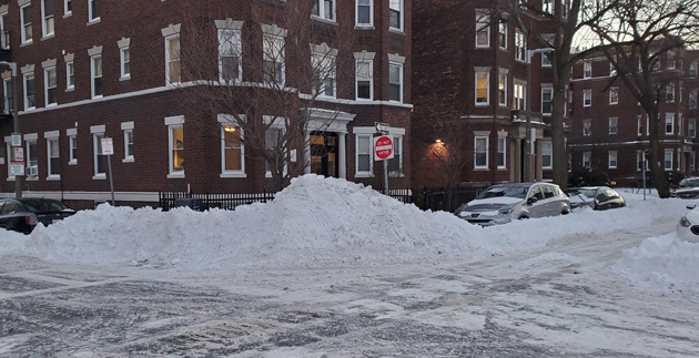 Snow piled up at Queensberry Street intersection