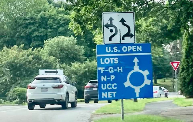 Sign by a parkway rotary