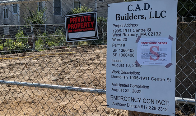 Stop-work order posted outside demolition site