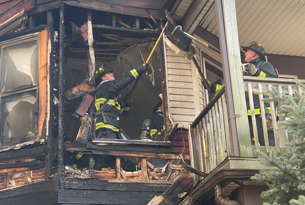 Firefighters on second floor of Wayland Street house
