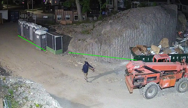 Surveillance photo of man at constructuion site