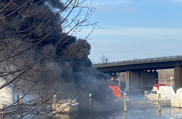 Boat on fire on the Mystic River