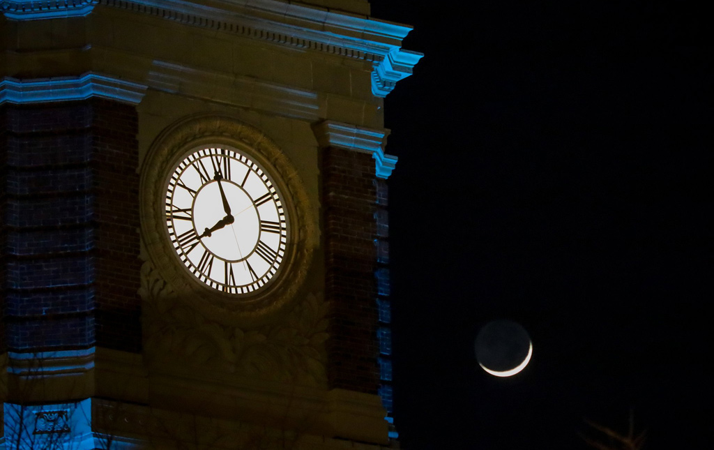 Chelsea City Hall and a crescent moon