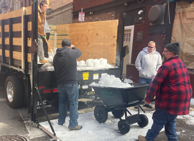 Snow being delivered to the North End