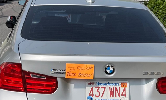 Boston parking ticket with obscene response on a BMW