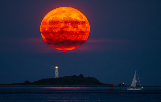 Sturgeon moon over Boston Light