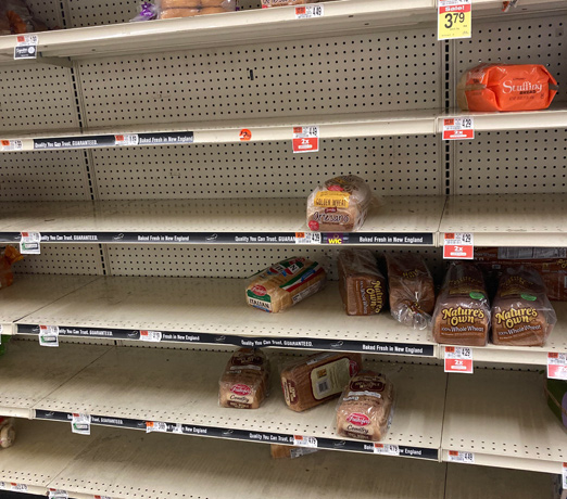 Empty bread shelves at one supermarket