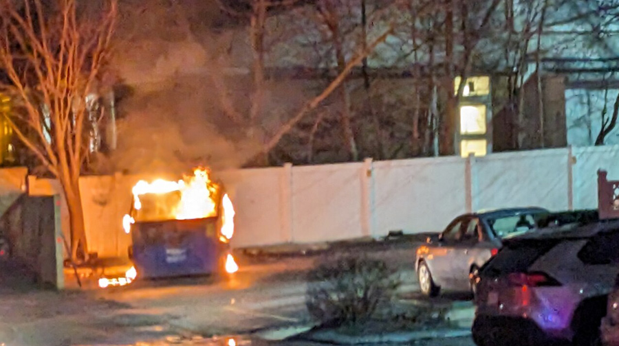 Dumpster on fire in North Cambridge