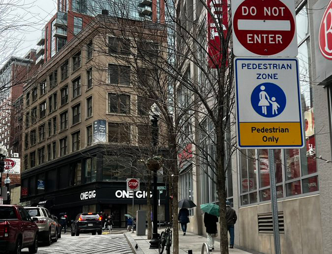 Pedestrian Only sign on Franklin Street downtown - with cars