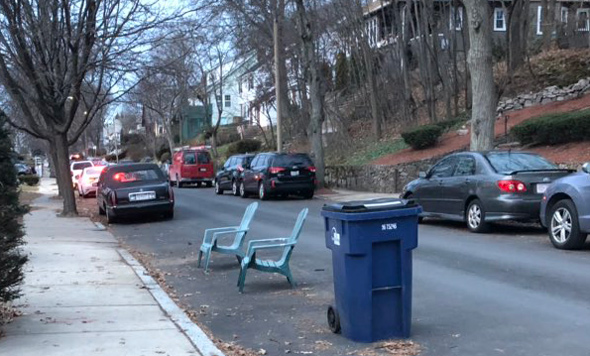Chairs saving space on Redlands Road in West Roxbury