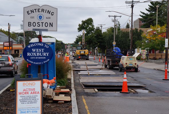 Trench being dug for new high-pressure gas line on Washington Street in West Roxbury