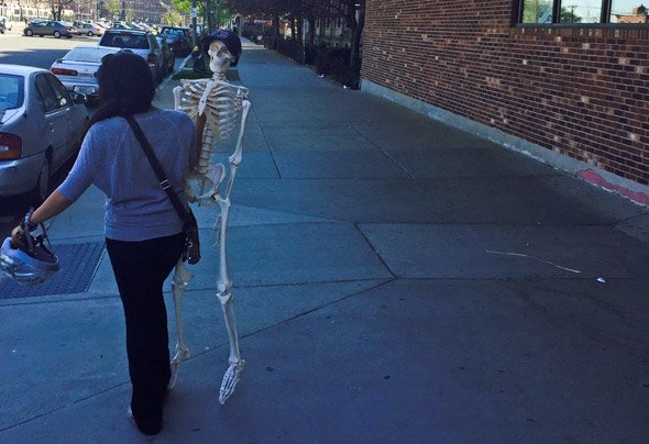 Woman with skeleton in Allston