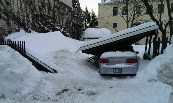 Carport crushed under weight of snow in Charlestown