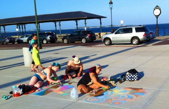 People using sidewalk chalk at Wonderland