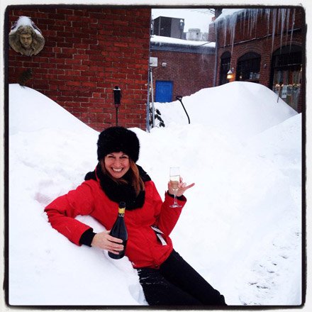 Sonia Garufi of Sophia's Grotto in Roslindale, with champagne