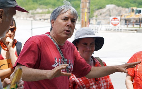 Chuck Collins explains protest against West Roxbury pipeline in front of quarry