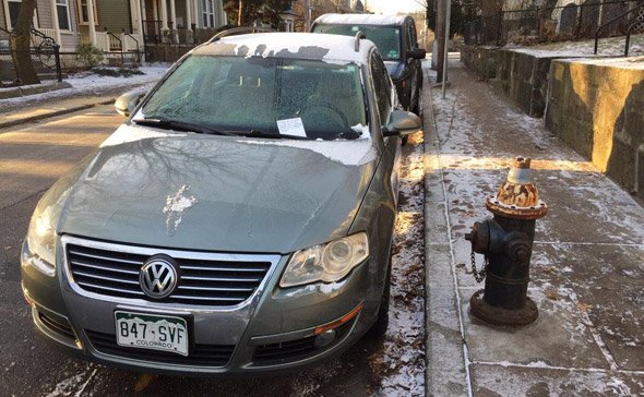 Car in front of a hydrant in Jamaica Plain